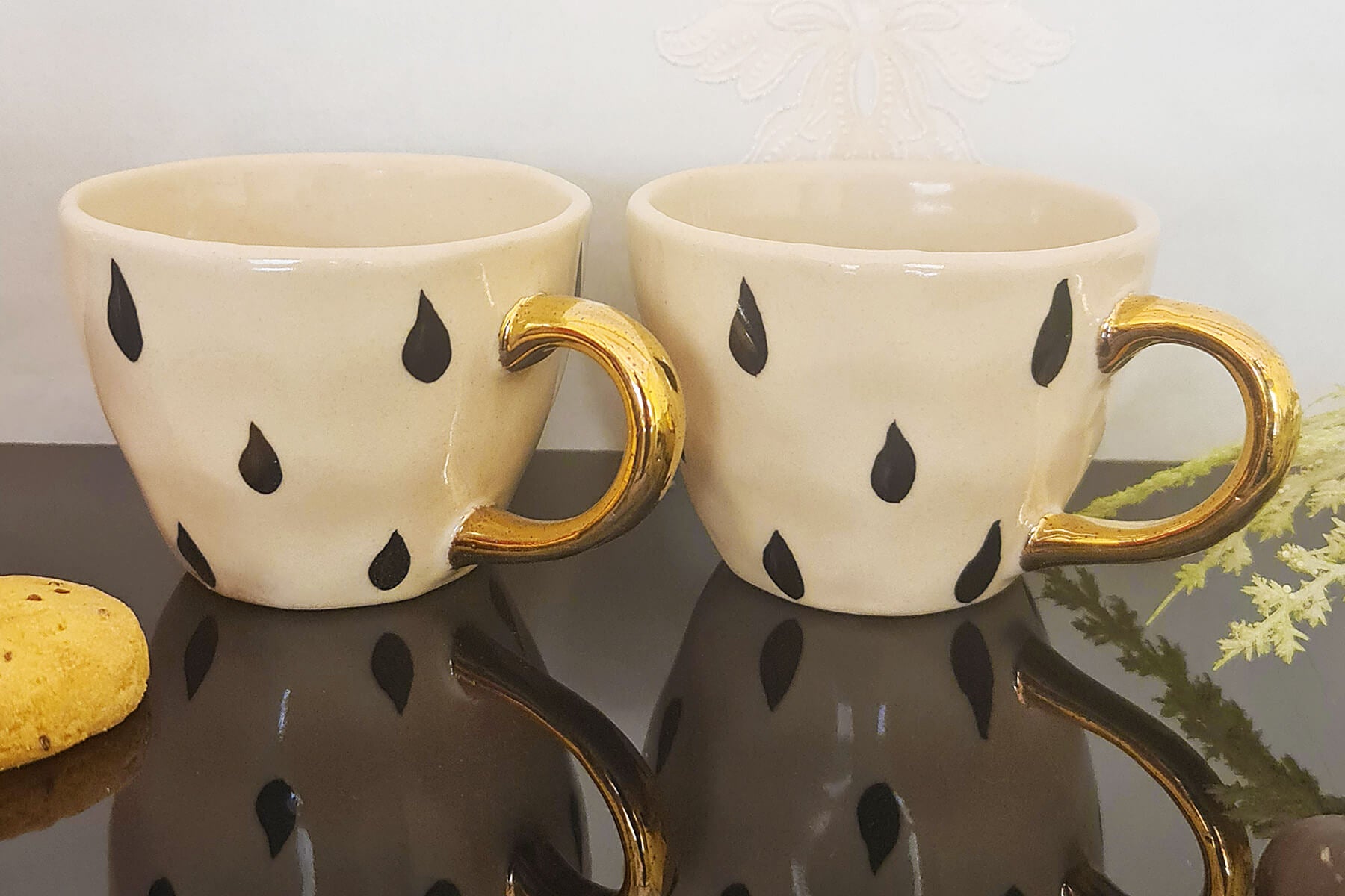 HANDMADE IVORY CERAMIC MUGS WITH BLACK DROPS DESIGN (SET OF 2)